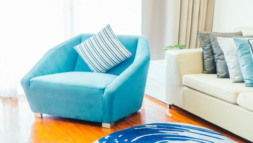 blue and white cushion couch