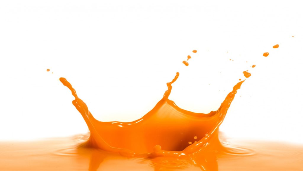 orange juice splashing over