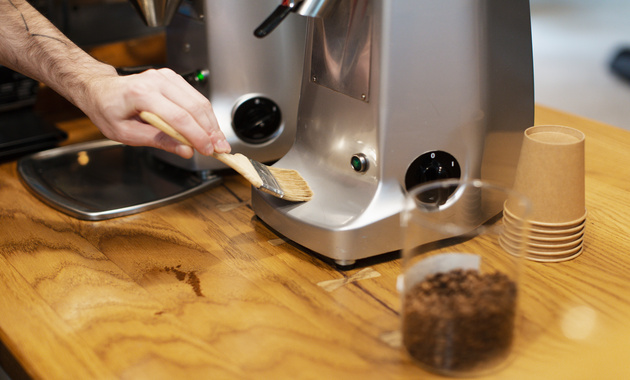 a man is wandering how to clean coffee maker without vinegar and with a brush